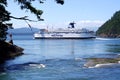 Ferry passing around navigation light Royalty Free Stock Photo