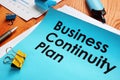 BCP Business Continuity Plan and stack of papers Royalty Free Stock Photo