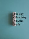 BCPM biology chemistry physics math symbol. Concept words BCPM biology chemistry physics math on wooden cubes. Royalty Free Stock Photo