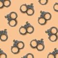 Bdsm and sex games concept. Many handcuffs on cream background Royalty Free Stock Photo