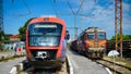 BDZ (Bulgarian State Railways) Freight and passenger trains at the station in Asenovgrad, Bulgaria.