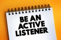 Be An Active Listener text on notepad, concept background Royalty Free Stock Photo