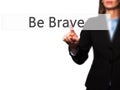 Be Brave - Female touching virtual button.