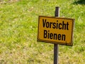 Be careful bees sign in german Royalty Free Stock Photo