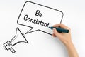 Be Consistent. Megaphone and text on a white background