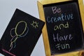 Be Creative and Have Fun on phrase colorful handwritten on blackboard Royalty Free Stock Photo