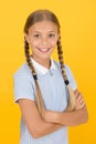 Be fashionable. small girl retro uniform. old school fashion. back to school. happy beauty on yellow background. happy