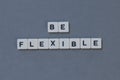 & x27; Be Flexible & x27; word made of square letter word on grey background Royalty Free Stock Photo