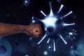 Be healthy - boost your immunity to fight with illness. African American man showing clenched fist surrounded by viruses, closeup