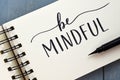 BE MINDFUL hand-lettered in notepad with brush pen Royalty Free Stock Photo