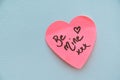 Be Mine hand wrote text on pink love heart with drawn hearts. On white isolated background. Love Valentines concept