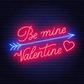 Be mine Valentine neon lettering dark background.