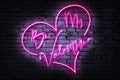 Be My Valentine Neon Sign on a dark wall