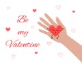 Be my Valentine phrase. Funny smiling heart in female hand. Woman holding love symbol. Valentines day greeting card. Vector Royalty Free Stock Photo