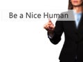 Be a Nice Human - Female touching virtual button. Royalty Free Stock Photo