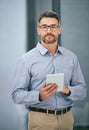 Be persistent in your search for success. Portrait of a mature businessman using a digital tablet in an office. Royalty Free Stock Photo