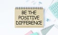 positive difference text on notepad on white table Royalty Free Stock Photo