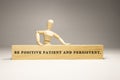 Be positive patient and persistent wooden surface was written. Motivation and personal development