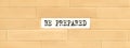 BE PREPARED text on wooden block wall, business