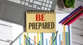 BE PREPARED written on a notepad with office tools,business Royalty Free Stock Photo