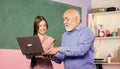 Be a problem solver. small girl with man tutor study on laptop. school shopping online. cyber monday. modern technology