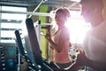 Be proud of each step you take towards your goal. a man and a woman working out together in the gym. Royalty Free Stock Photo