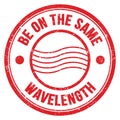 BE ON THE SAME WAVELENGTH text on red round postal stamp sign Royalty Free Stock Photo