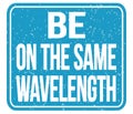 BE ON THE SAME WAVELENGTH, words on blue stamp sign Royalty Free Stock Photo