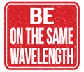 BE ON THE SAME WAVELENGTH, words on red stamp sign Royalty Free Stock Photo