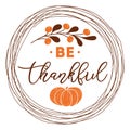 Be thankful text decorated fall branch with berry pumpkin into circle wreath orange brown autumn colors Thanksgiving day Royalty Free Stock Photo