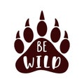 Be wild. Hand drawn inspiration quote with bear paw silhouette.