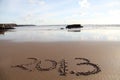 Beach with 2013 in sand Royalty Free Stock Photo