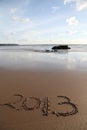 Beach with 2013 in sand Royalty Free Stock Photo