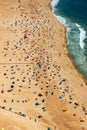 Beach from Above with Many Umbrellas and People