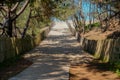 Beach access Wooden path at atlantic sea over sand dunes with ocean Le Porge in gironde France southwest Royalty Free Stock Photo