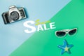 The beach accessories on the green and blue background. Summer sale beautiful web banner Royalty Free Stock Photo