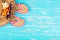 Beach accessories on turquoise wooden table Royalty Free Stock Photo