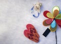 Beach accessories on a white towel flatlay horizontal Royalty Free Stock Photo