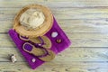 Beach accessories on a wooden background Royalty Free Stock Photo