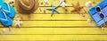 Beach Accessories On Yellow Wooden Plank - Summer Colors