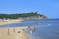 Beach with an ancient fortress on the background, Penglai, China