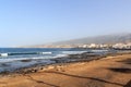 Beach and Atlantic Ocean panorama in holiday resort Playa de las Americas on Canary Island Tenerife, Spain