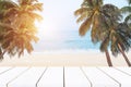 beach background,top of wood table with blurred sea and coconut tree background Royalty Free Stock Photo