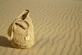 Beach bag on a sand dune Royalty Free Stock Photo