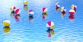 Beach ball floating on blue water Royalty Free Stock Photo