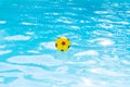 Beach ball floating in swimming pool background, relaxation and fun concept, summer vacations Royalty Free Stock Photo