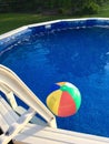 Beach Ball Floats on Surface of Above-Ground Swimming Pool
