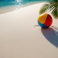 Beach ball on sand with shadow of palm tree leaf Royalty Free Stock Photo