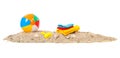 Beach ball,towels and toys Royalty Free Stock Photo