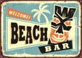 Beach bar advertising with Hawaii tiki mask